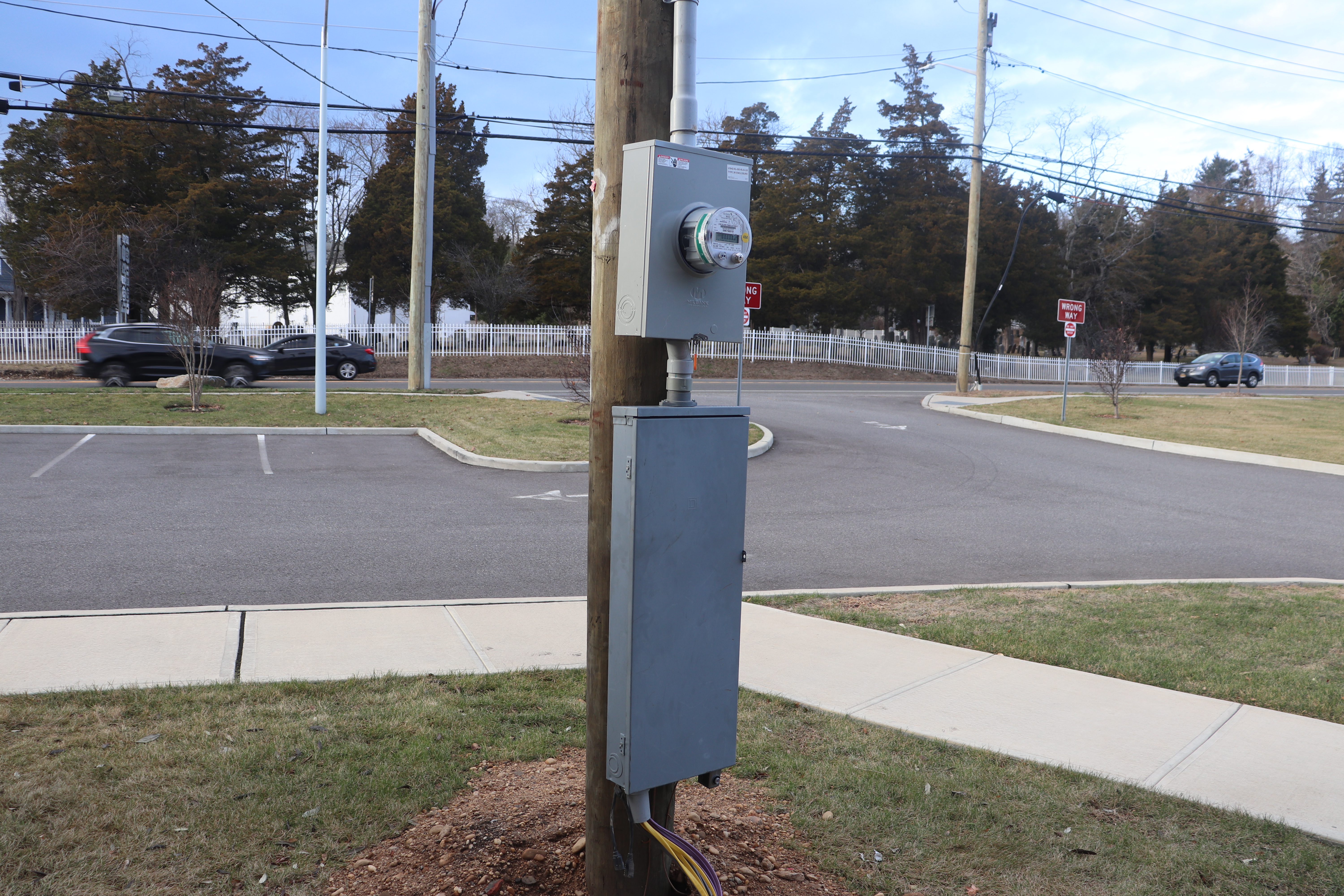 temporary electrical pole on the front lawn