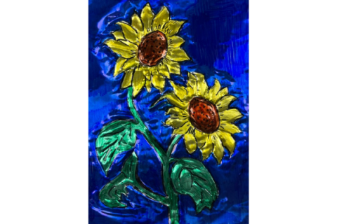 Metal embossed sunflowers on a blue background.