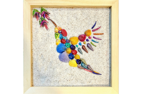 Colorful Hummingbird wall hanging made out of sea shells.