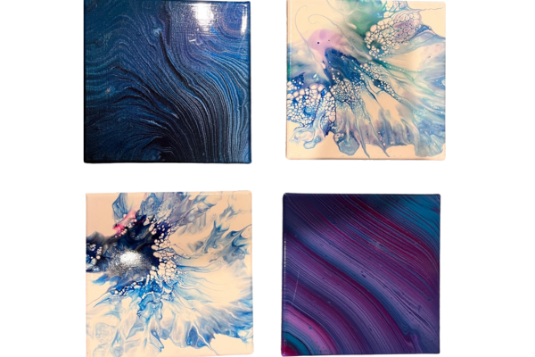 Four canvases with swirling paint design.