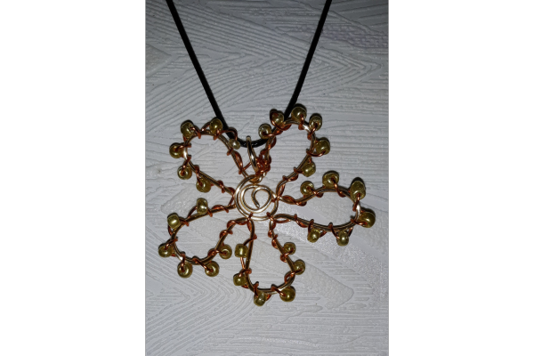 Wire Pendant Flower shaped with beads.